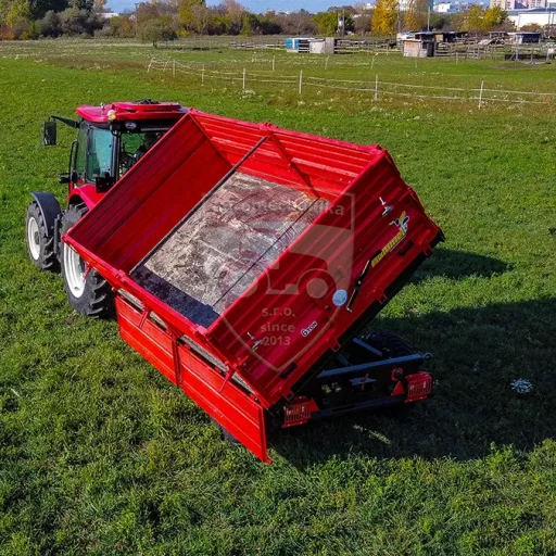 Traktorová vlečka HUMMEL RMU 1260 s nosnosťou 6T a trojstranne sklopná a traktor BAŠAK 2075 PLUS - Agromechanika s.r.o.